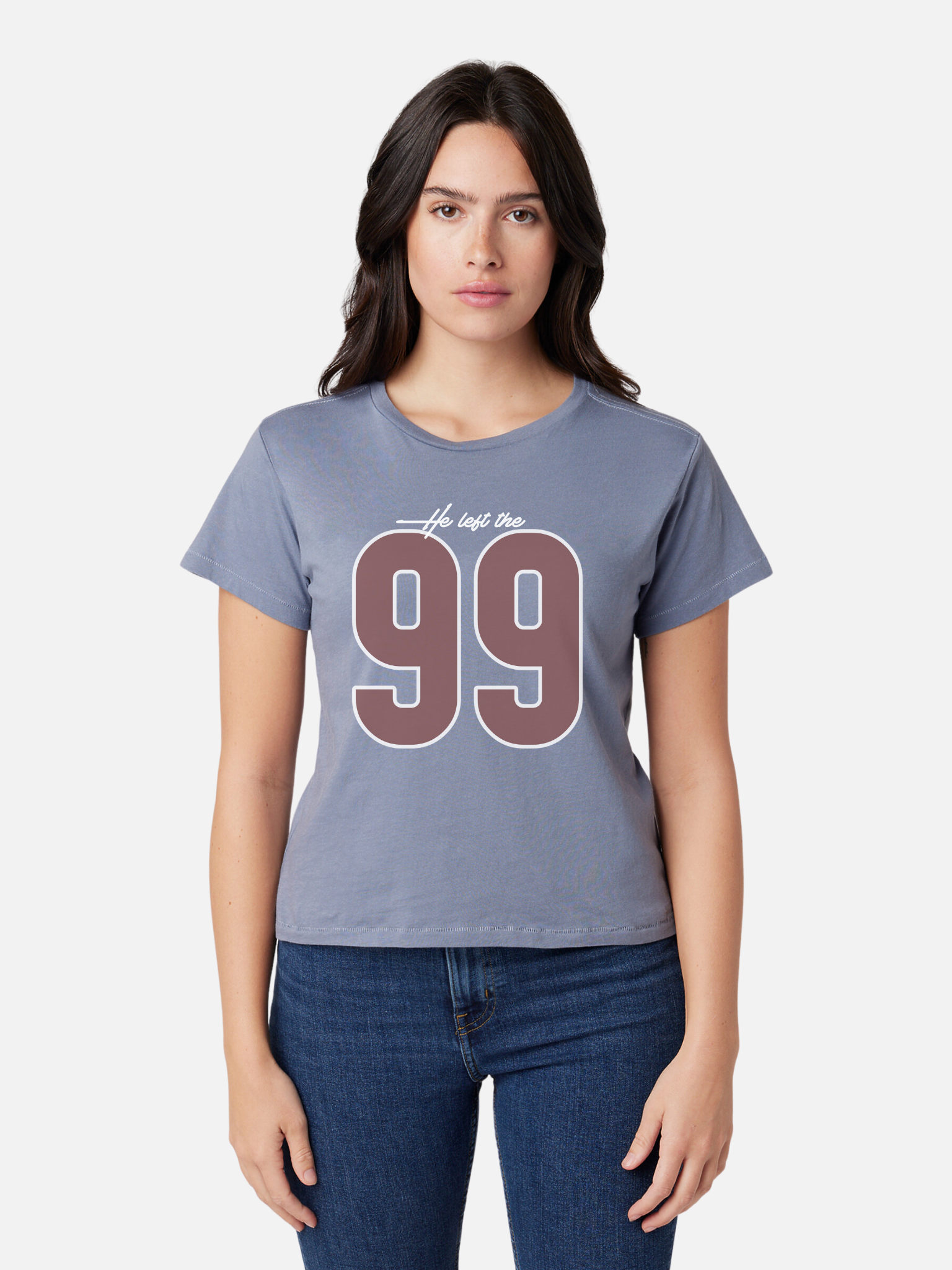 Woman wearing SĒK Apparel He Left the 99 Baby Tee in blue — Christian graphic baby tee with bold '99' design