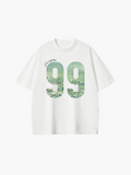SĒK Apparel He Left the 99 Box Tee — flat lay product shot of faith-inspired graphic tee with '99' sheep design, referencing the parable of the lost sheep