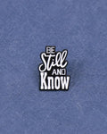 SĒK Apparel Be Still and Know enamel pin — faith-inspired Christian lapel pin with 'Be Still and Know' text referencing Psalm 46:10, front view 