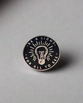 SĒK Apparel Be a Light enamel pin — gold and white Christian enamel pin with 'Be a Light' text, front view on white background