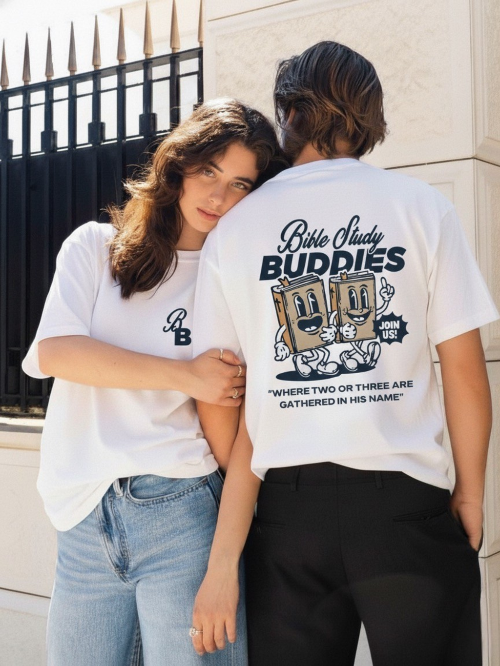 Two friends wearing the SĒK Apparel Bible Study Buddies Tee — white Christian graphic tee, perfect for faith community and Bible study groups