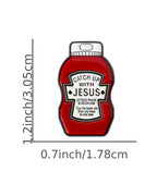 Red ketchup bottle-shaped enamel pin with 'Catch Up With Jesus' text, measurements on a white background