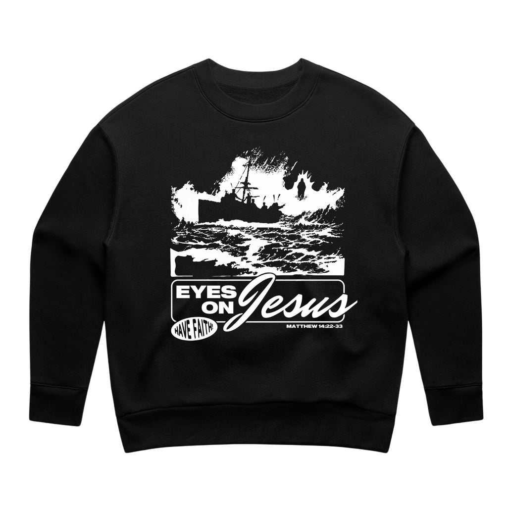 SĒK Apparel Eyes on Jesus Crewneck in black — flat lay with 'Eyes on Jesus' graphic design, faith-inspired Christian crewneck sweatshirt