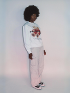 Woman wearing the SĒK Apparel FaithFULL Crewneck — front view of faith-inspired Christian sweatshirt with bear graphic design