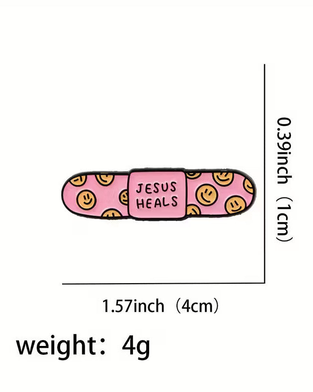 Pink bandage with 'Jesus Heals' text and smiley faces, shown with measurements and weight on a white background.