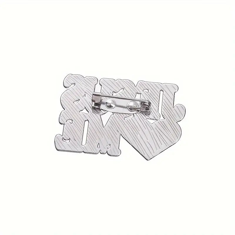 SĒK Apparel Jesus Loves Me enamel pin — back view showing pin clasp and hardware detail