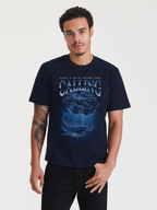 Man wearing the SĒK Apparel Jonah Vintage Tee in navy — front view of faith-inspired Christian vintage graphic tee with Jonah and the whale design, referencing Jonah 1-2