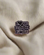 SĒK Apparel Love Faith Hope enamel pin — faith-inspired Christian lapel pin with 'Love Faith Hope' text, referencing 1 Corinthians 13:13