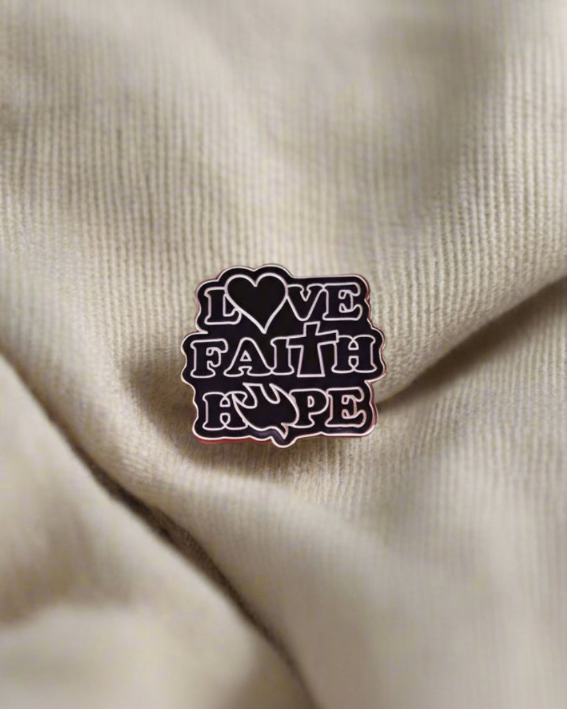 SĒK Apparel Love Faith Hope enamel pin — faith-inspired Christian lapel pin with 'Love Faith Hope' text, referencing 1 Corinthians 13:13