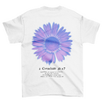 SĒK Apparel Made New Flower Tee in white — flat lay back view with floral graphic and 2 Corinthians 5:17 scripture design
