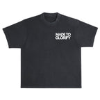 SĒK Apparel Made to Glorify Tee in faded black — flat lay front view of faith-inspired Christian graphic tee