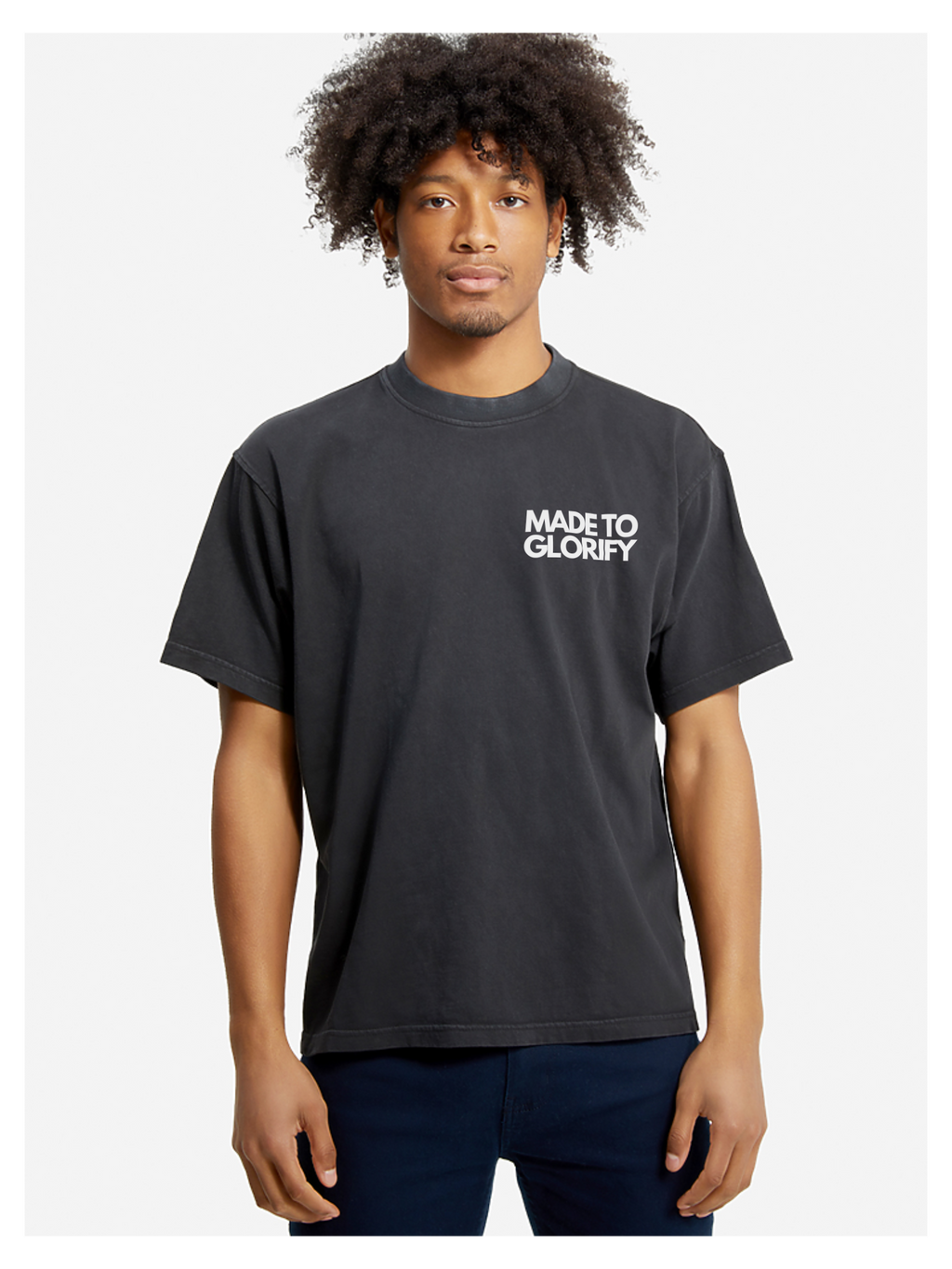 Man wearing the SĒK Apparel Made to Glorify Tee in faded black — front view of faith-inspired Christian graphic tee