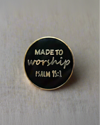 SĒK Apparel Made to Worship enamel pin — black pin with gold edging, 'Made to Worship' in white and 'Psalm 95:1' in gold, faith-inspired Christian lapel pin